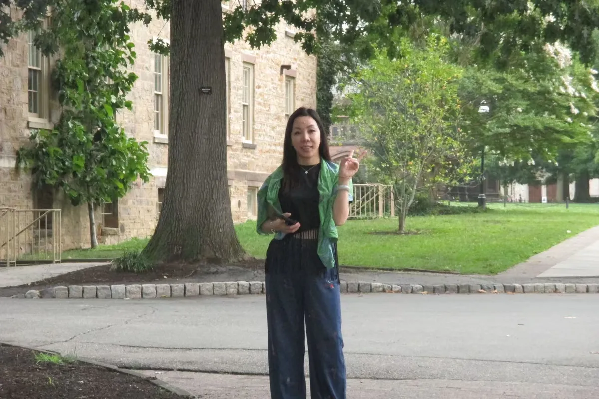 June Zhang on a university campus abroad