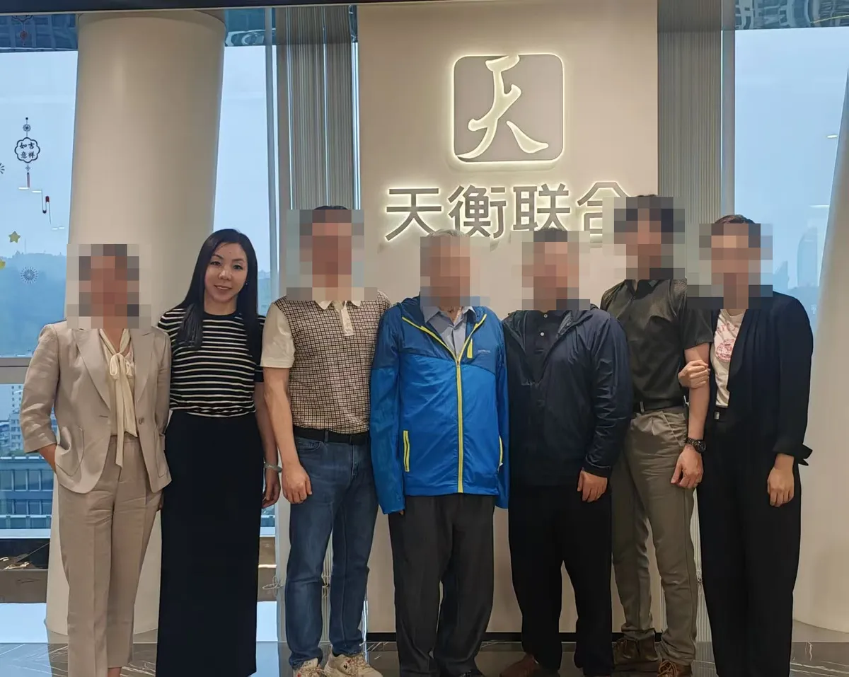 June Zhang with colleagues at her law firm in Xiamen