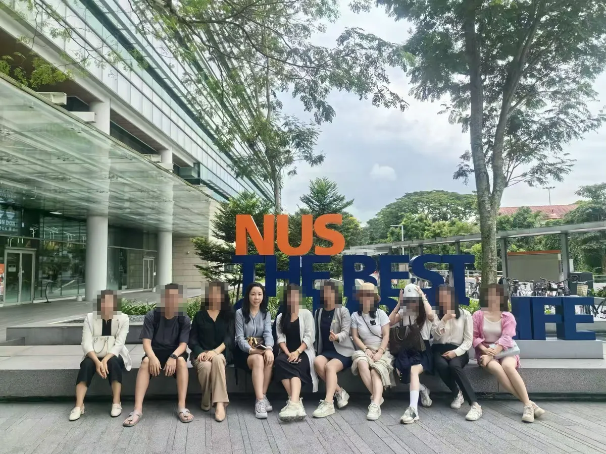 June Zhang with a group at the National University of Singapore